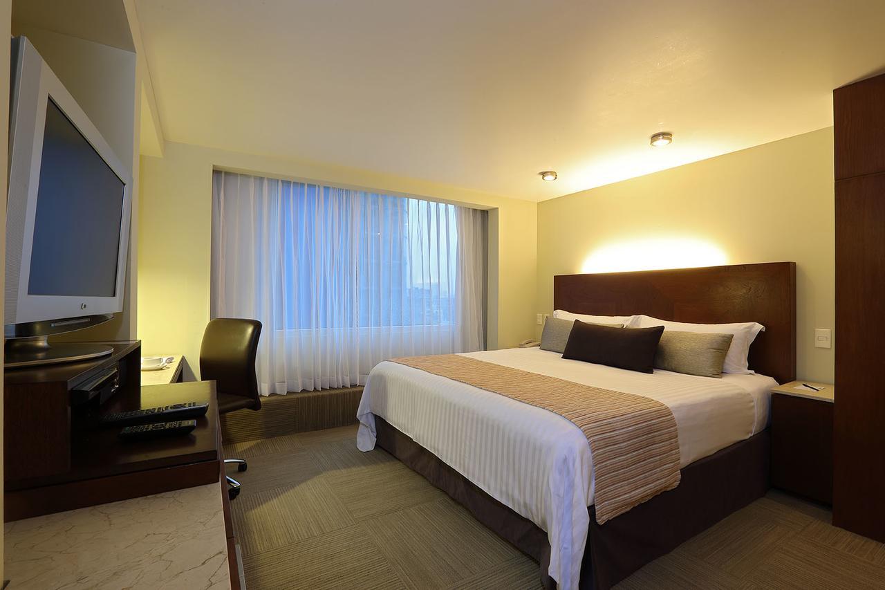 Hotel Emporio Reforma México DF Habitación foto A bedroom at the hotel